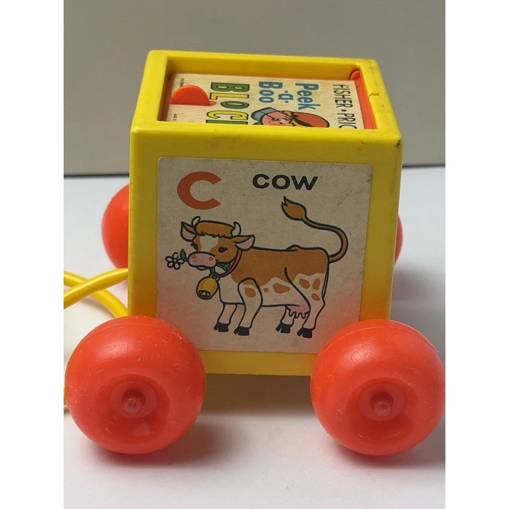 1970 Fisher Price Peek-a-Boo Block Squeeze Bulb Baby Pull Toy 760